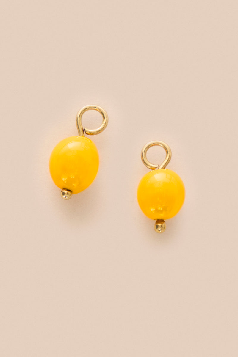 PAIR OF GLASS ARTISANAL BEADS - AMBER